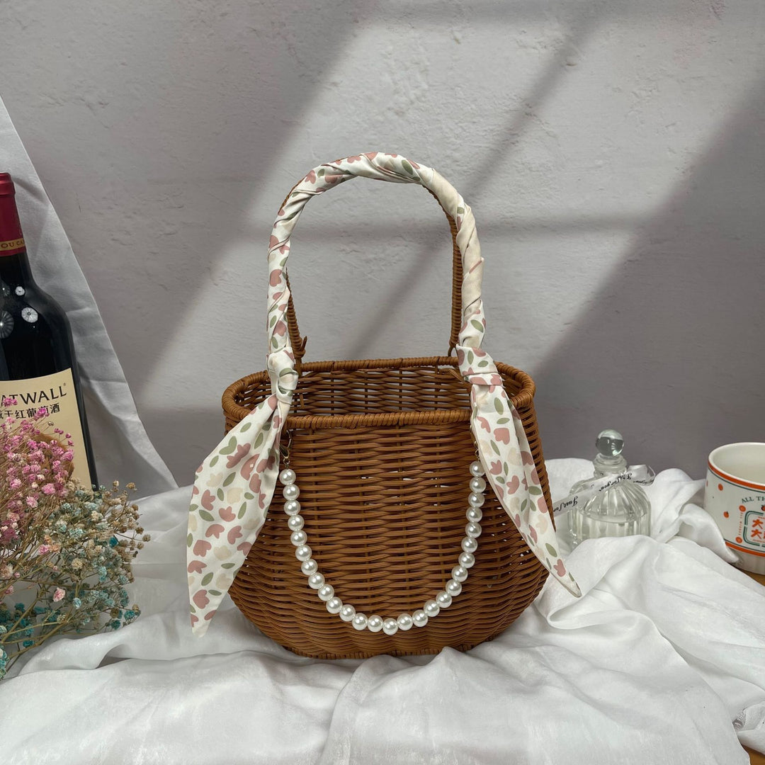 Women's stylish rattan container with pearl handle Stornfield