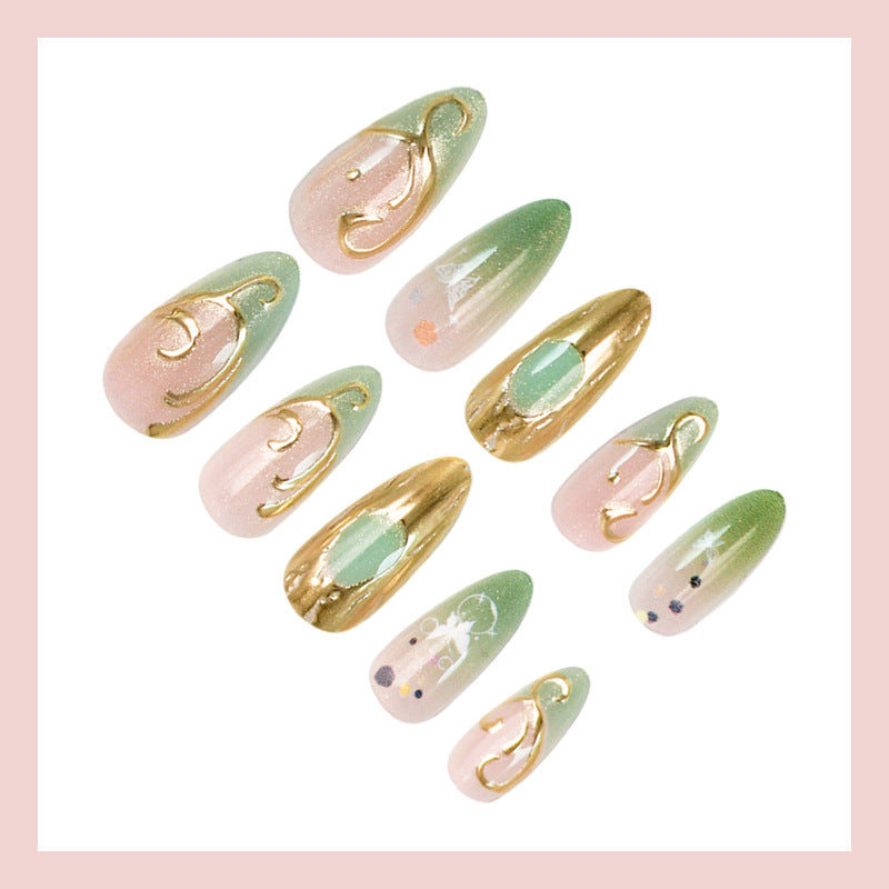 Nail art set with elegant gold accents and floral designs Stornfield