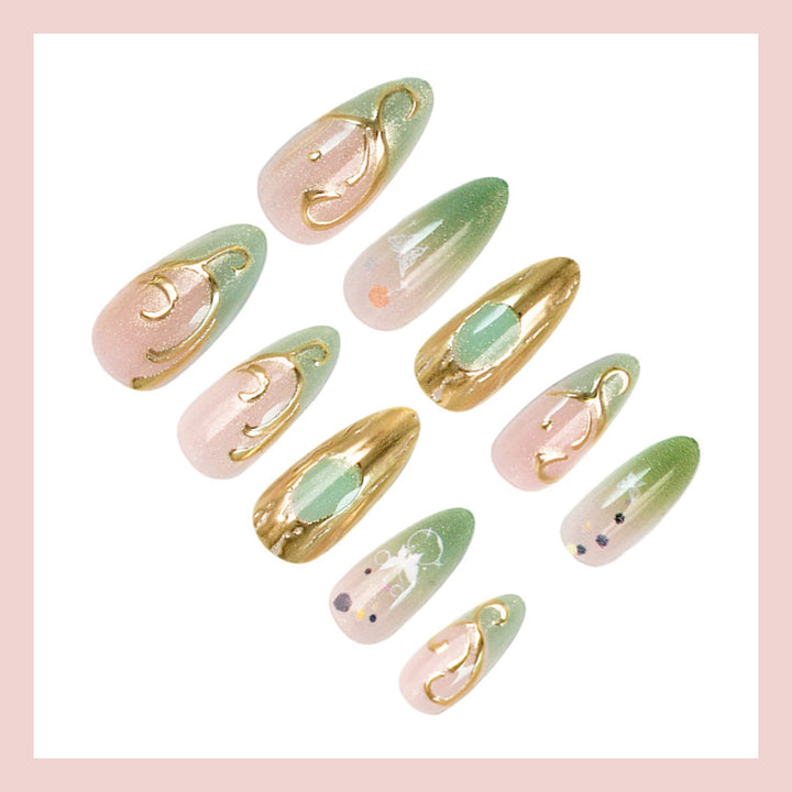 Nail art set with elegant gold accents and floral designs Stornfield