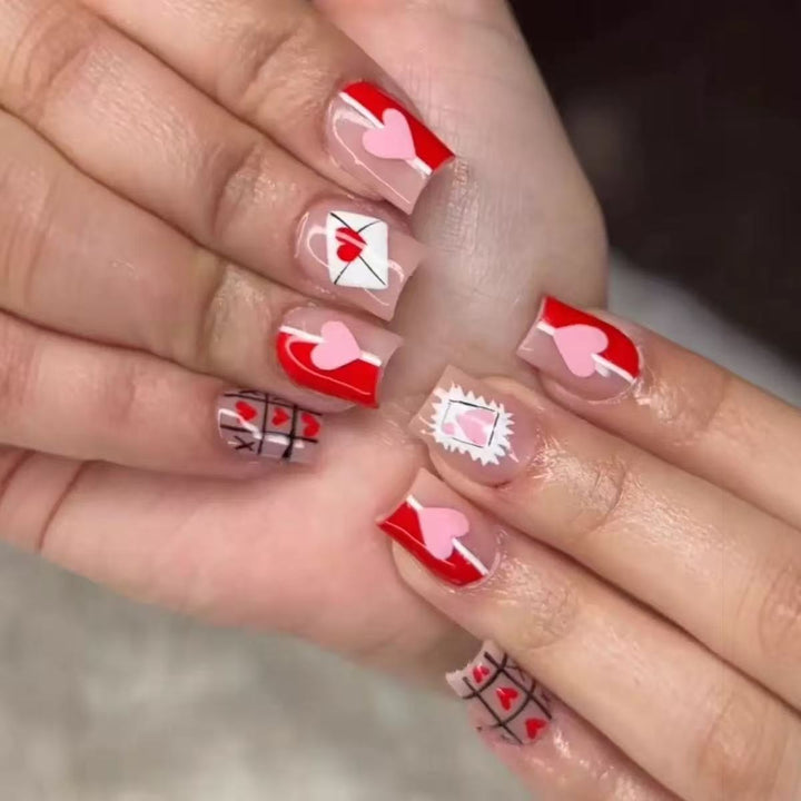 Artificial nail set with romantic heart and envelope motifs Stornfield