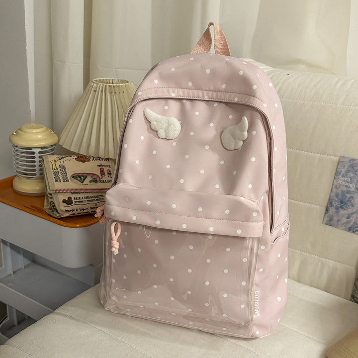 Polka Dot Patterned Backpack with Playful Wing Accents Stornfield