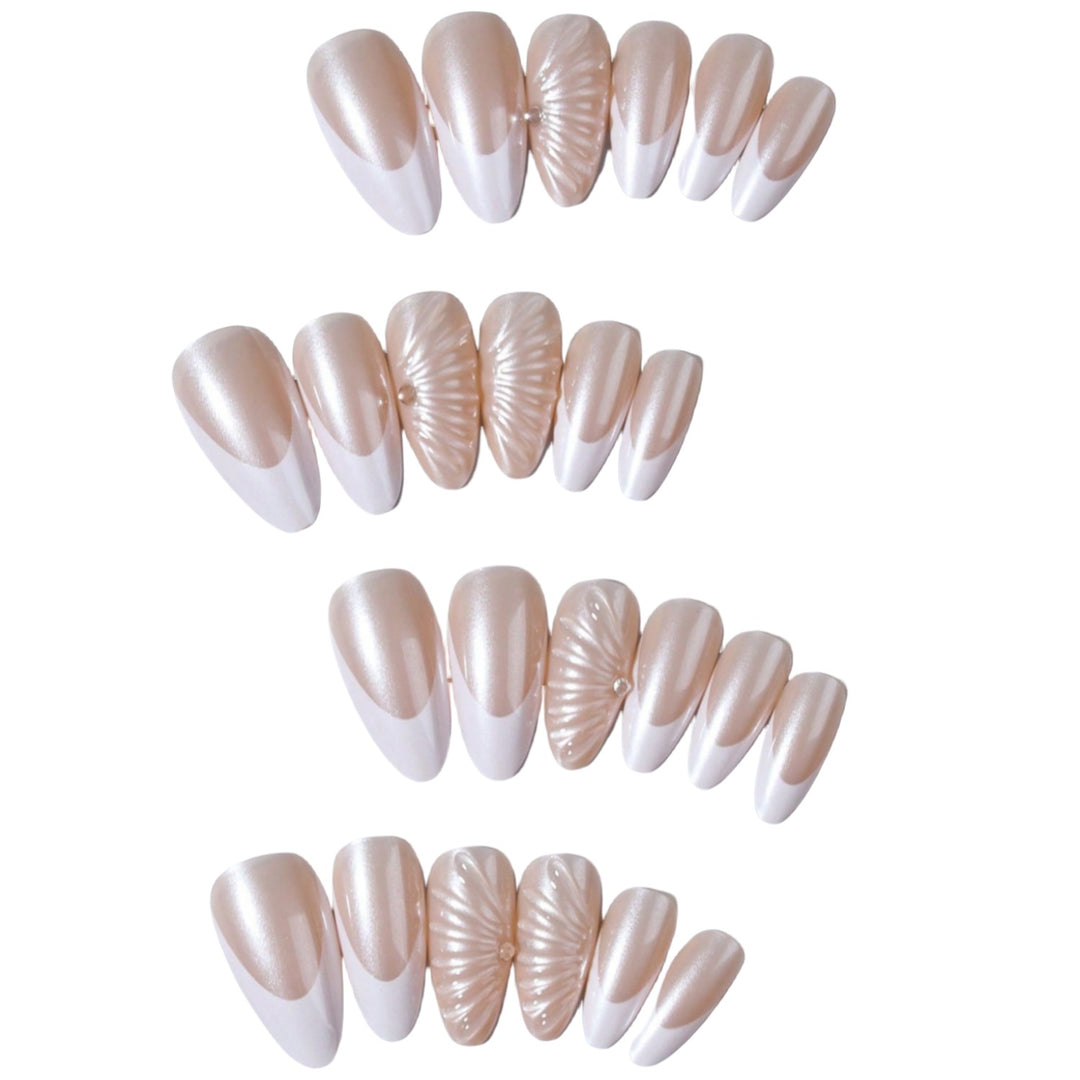 Artificial nail set with elegant shell pattern and glitter accents Stornfield