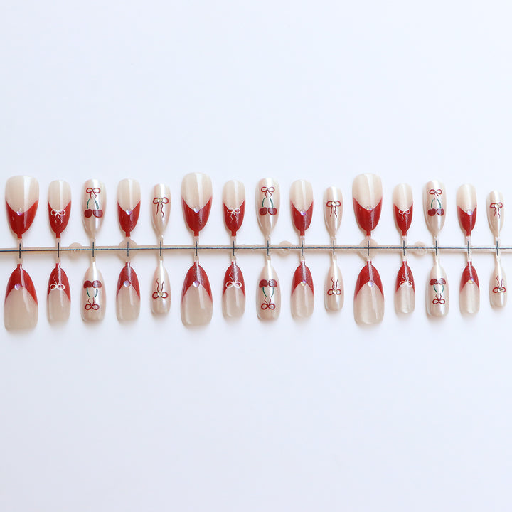 Artistic Press-On Nail Set with Cherry and Ribbon Design Stornfield