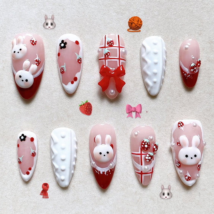 Creative acrylic nail set with playful bunny and gift designs Stornfield
