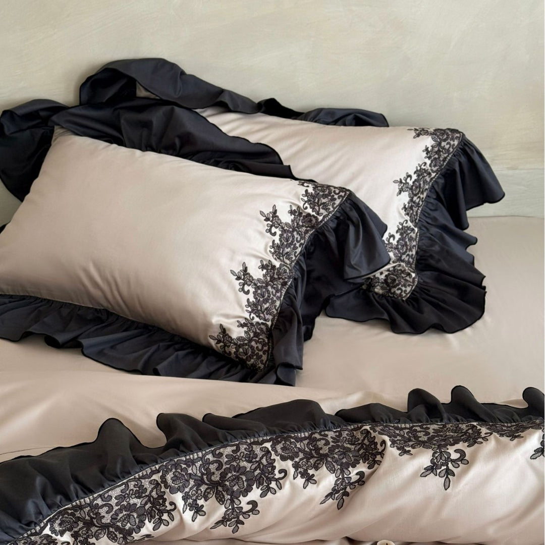 Satin bedding set with contrasting ruffle and ornament embroidery