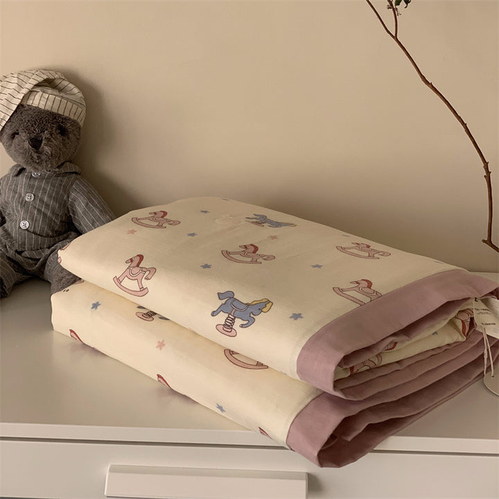 Soft muslin baby blanket with teddy design and double-layered gauze