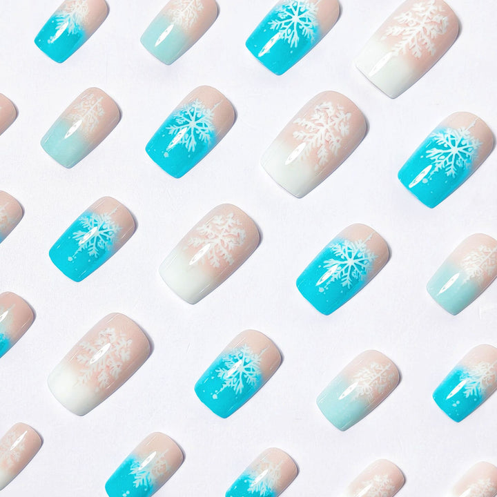 Wintry Artistic Nails with Shimmering Snowflake Design Stornfield