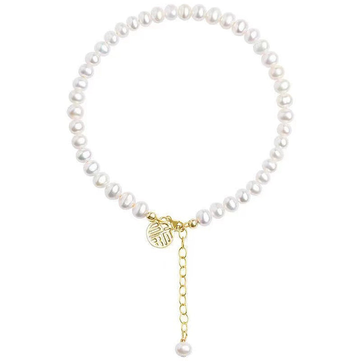 Elegant Pearl Charm Bracelet Stornfield