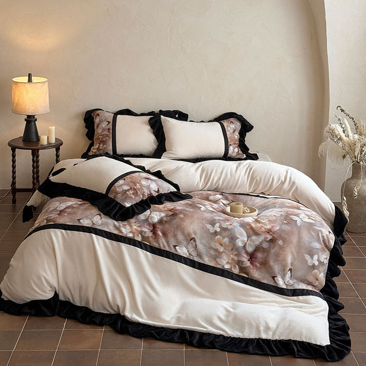 Satin bedding set with ruffle trim and floral butterfly design