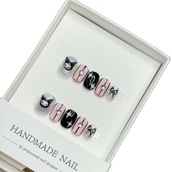Whimsical Press-On Nail Art Set with Cat and Bow Accents
