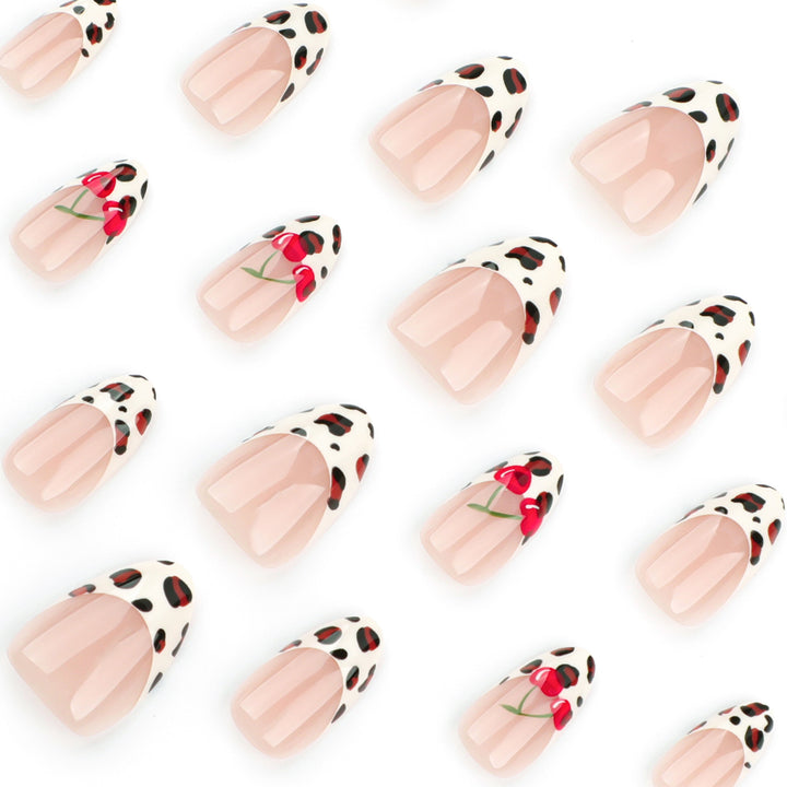 Artful animal pattern nails with cherry accents Stornfield
