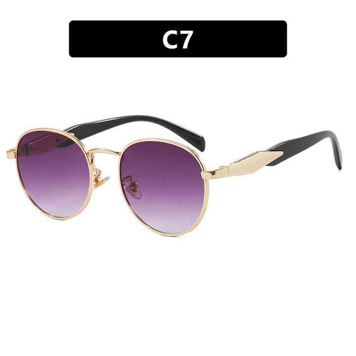 Women's round sunglasses with elegant golden frame and UV protection Stornfield