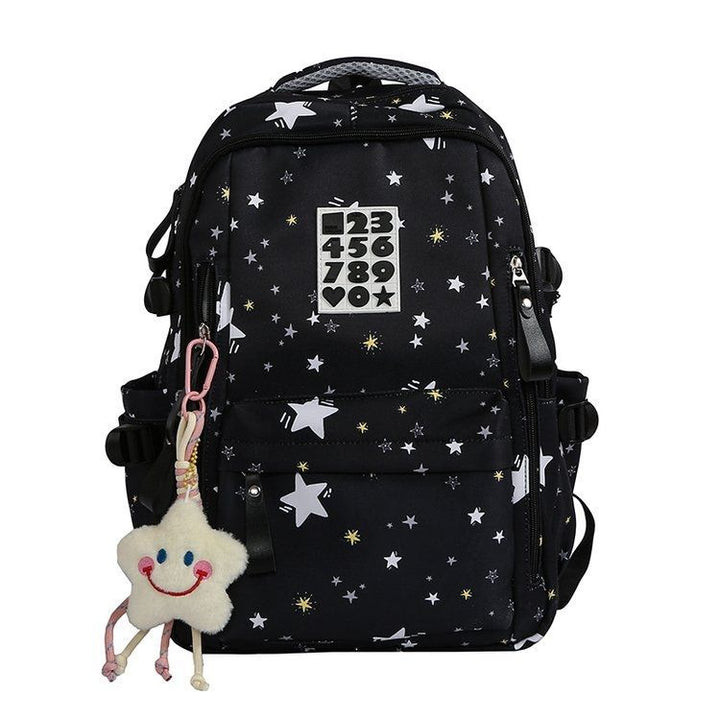 Playful backpack with star motifs and practical functions Stornfield