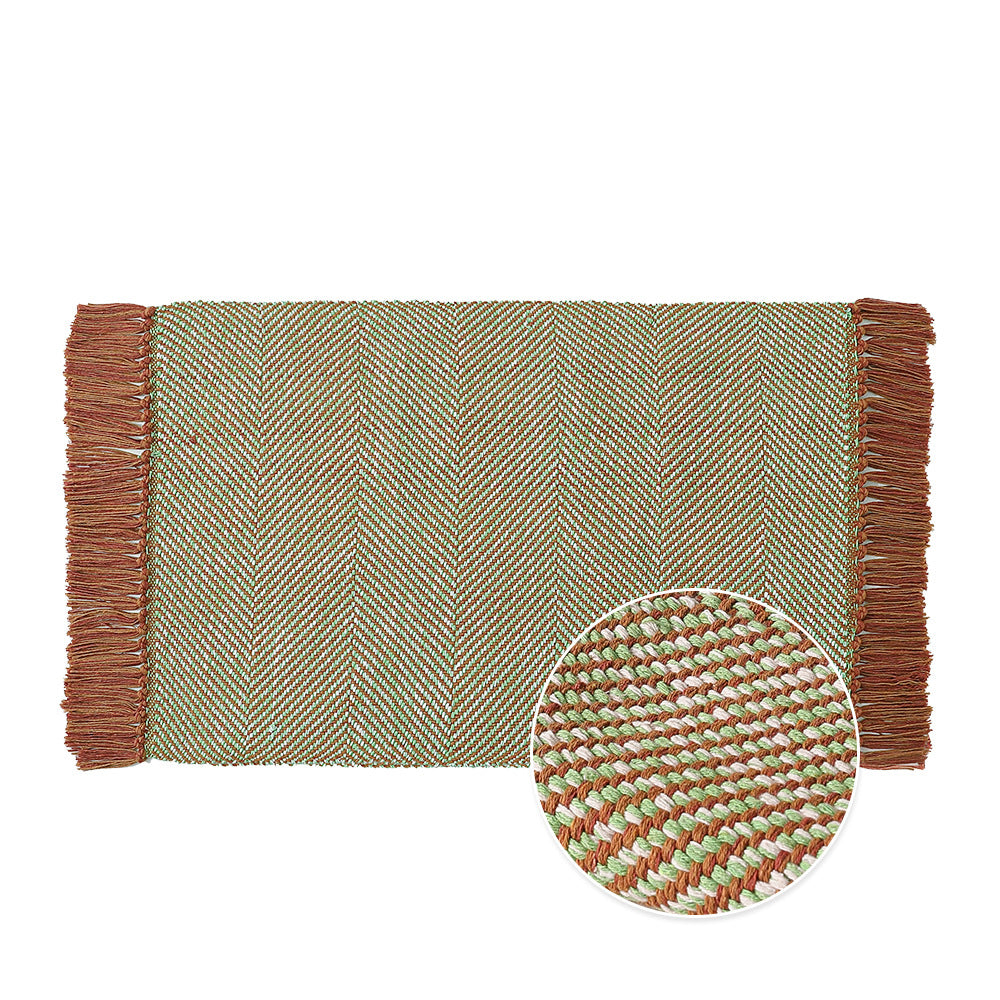 Woven table runner made of cotton blend with fine structure and herringbone look as well as decorative fringes Stornfield