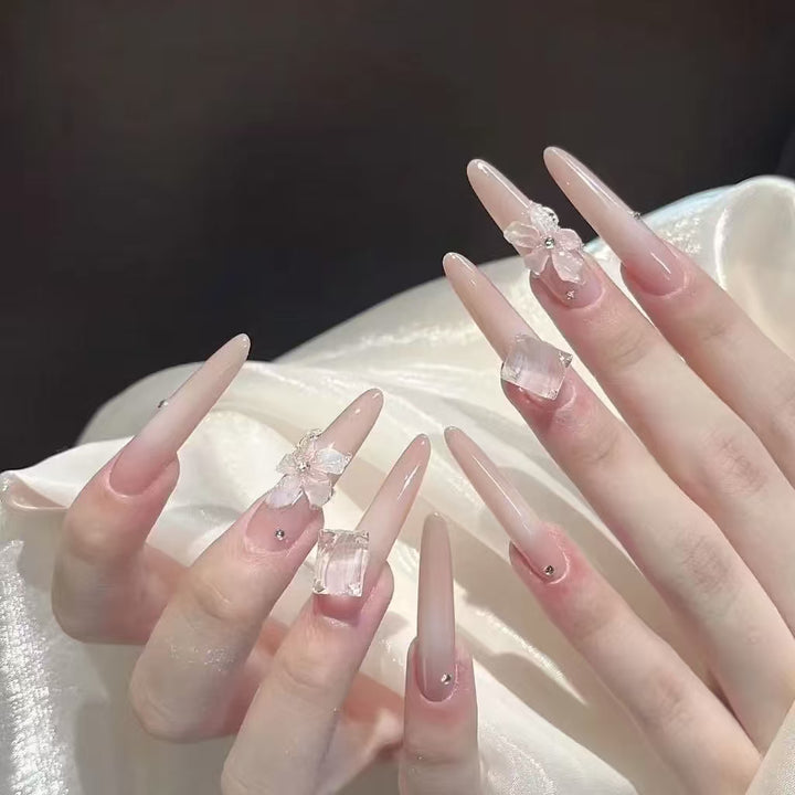 Artistic Stiletto Press-On Nail Art with Glimmering Accents Stornfield
