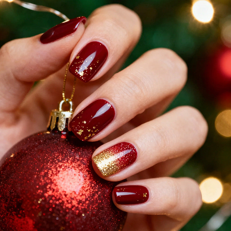 Acrylic nail set with sparkling accents and festive design Stornfield
