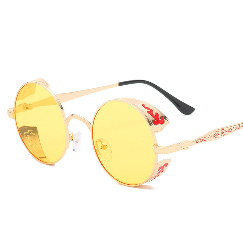 Ladies round sunglasses with luxurious gold frame and decorative elements Stornfield