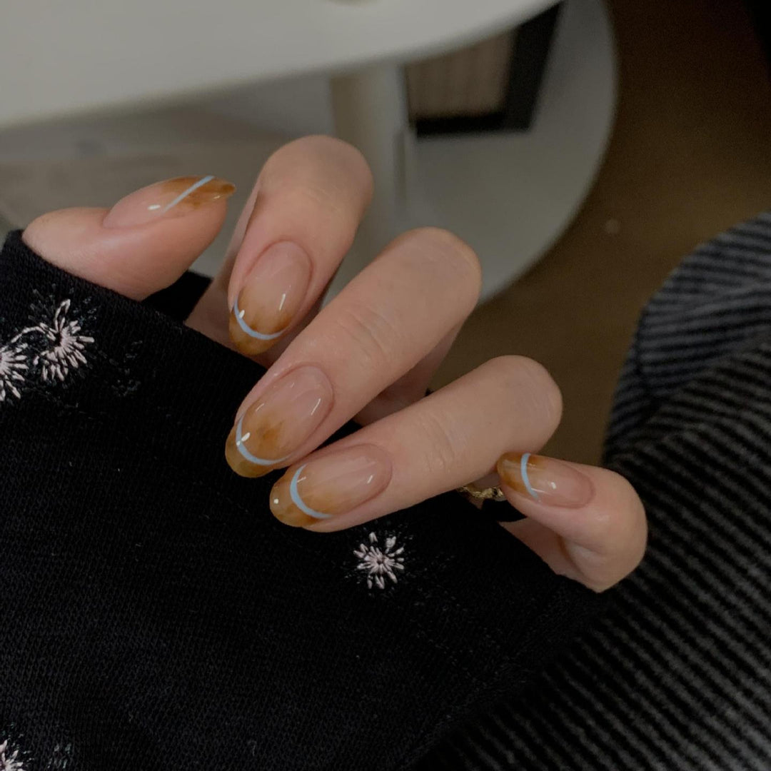 Artificial nails with modern French manicure design Stornfield