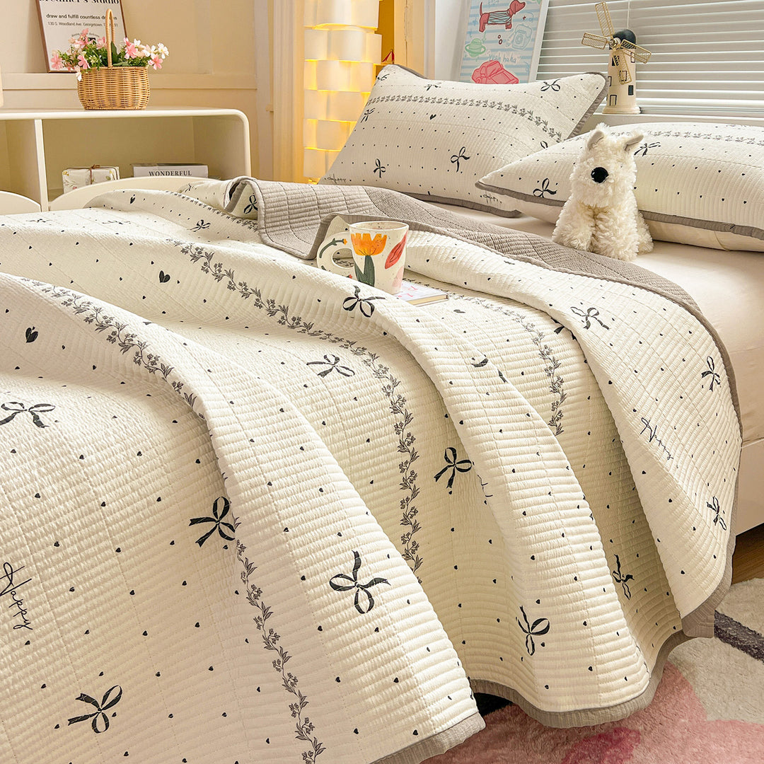Textured Botanical Print Quilted Bedspread
