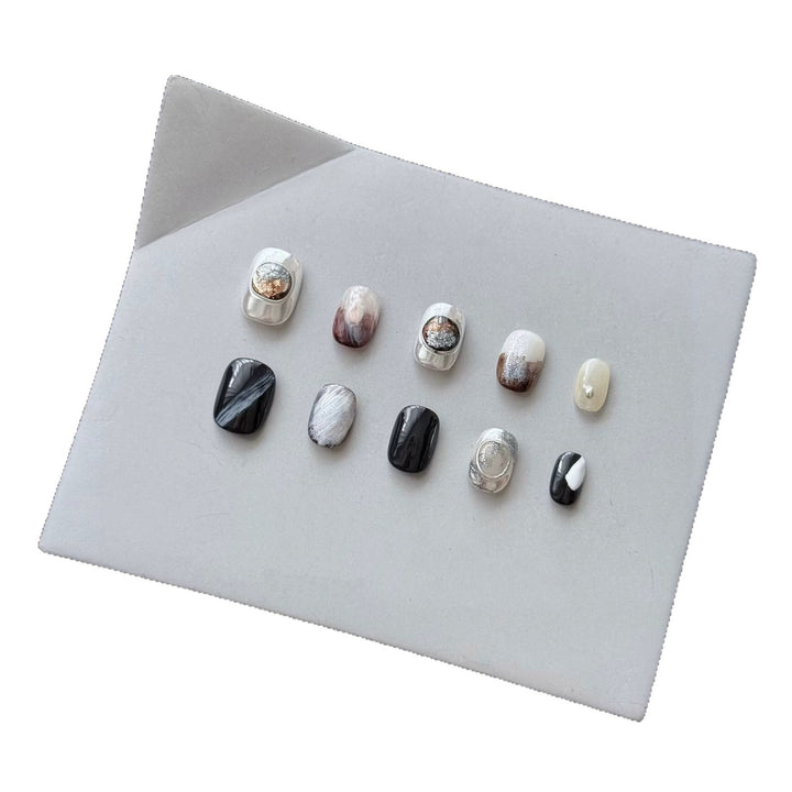 Artistic Press-On Nail Set with Elegant Designs