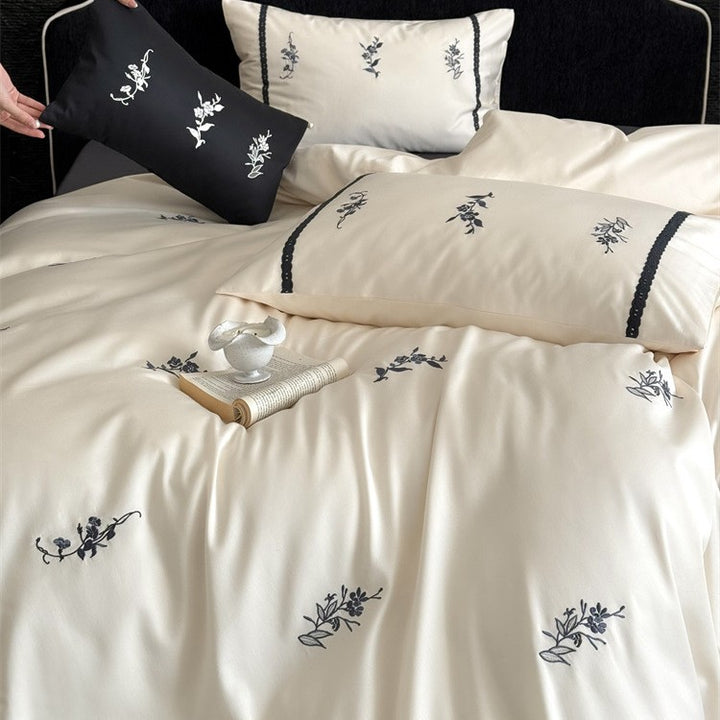 Luxurious satin bed linen set with fine floral embroidery Stornfield