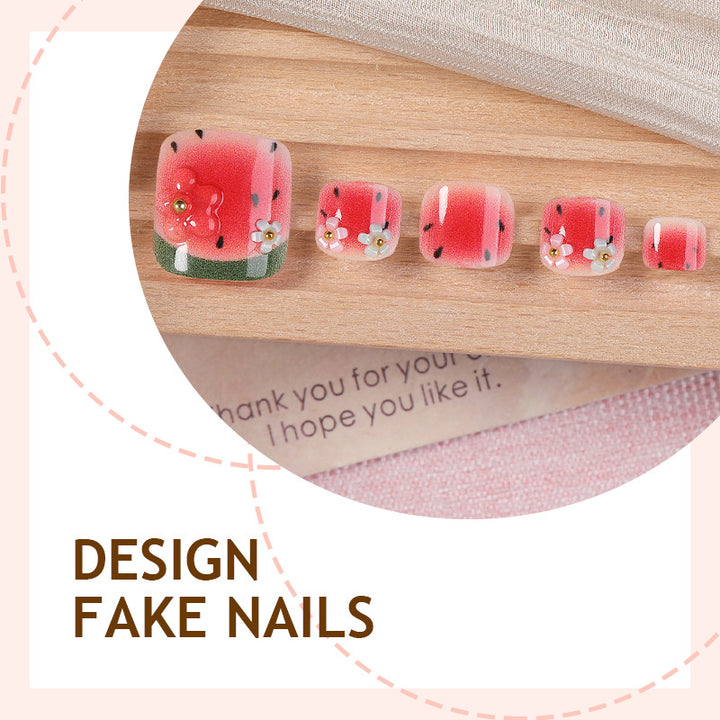 Nail set with watermelon design and floral accents Stornfield