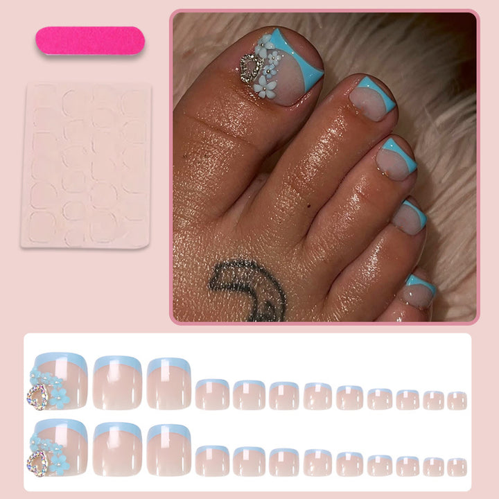 Nail art set with elegant flower and glitter accents Stornfield
