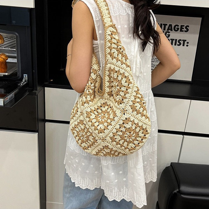 Hand-knotted shoulder bag with floral motifs Stornfield