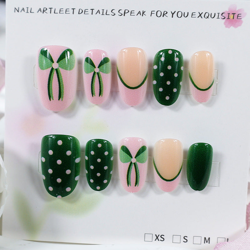 Art nail set with floral accents and playful designs Stornfield