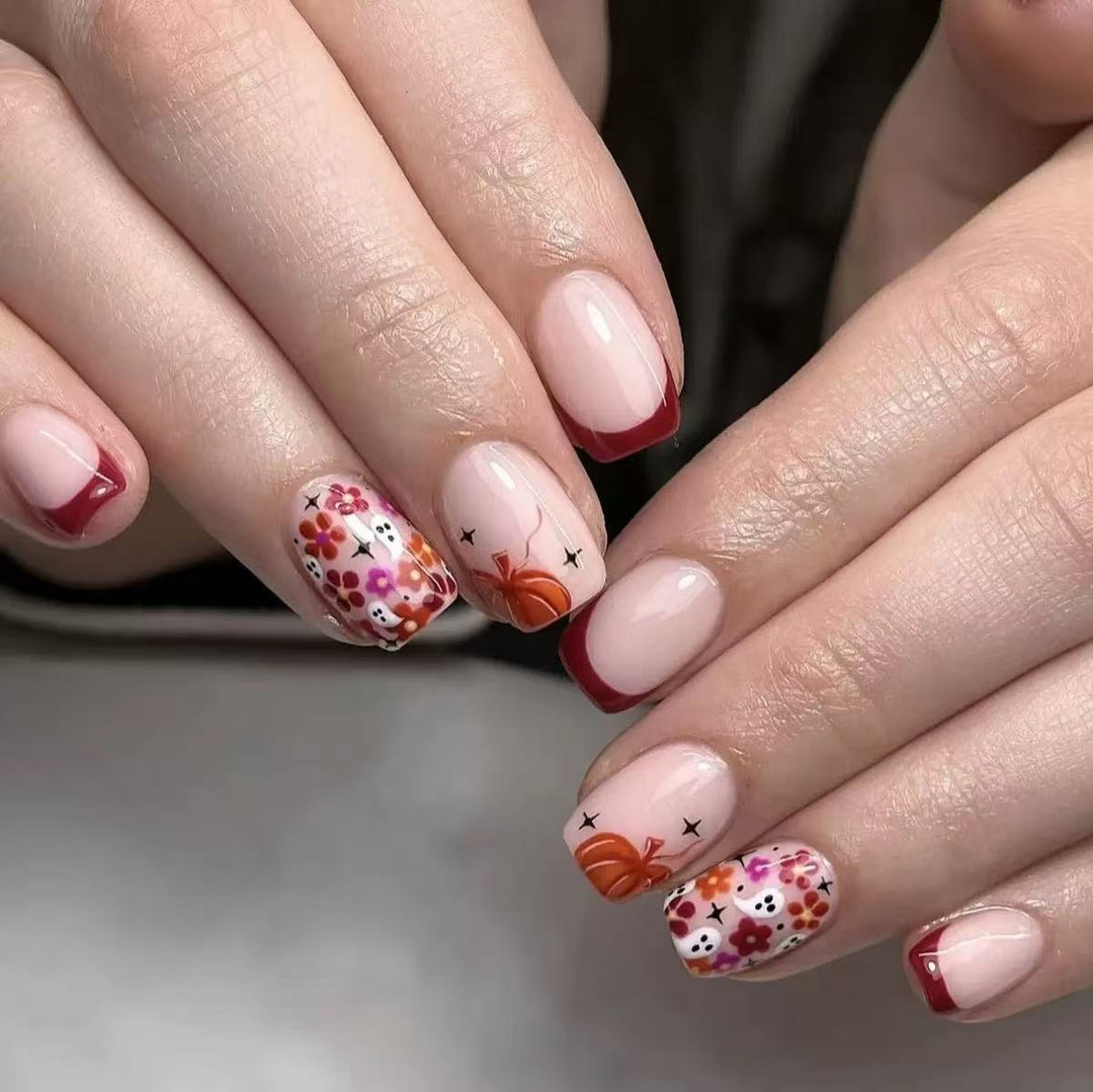 Artificial nail set with cheerful flower designs and elegant French tips Stornfield