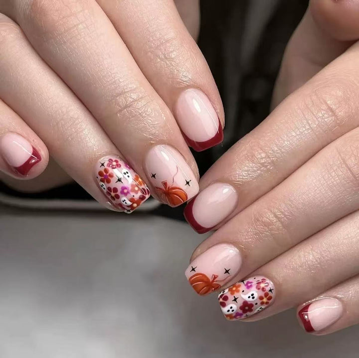 Artificial nail set with cheerful flower designs and elegant French tips Stornfield
