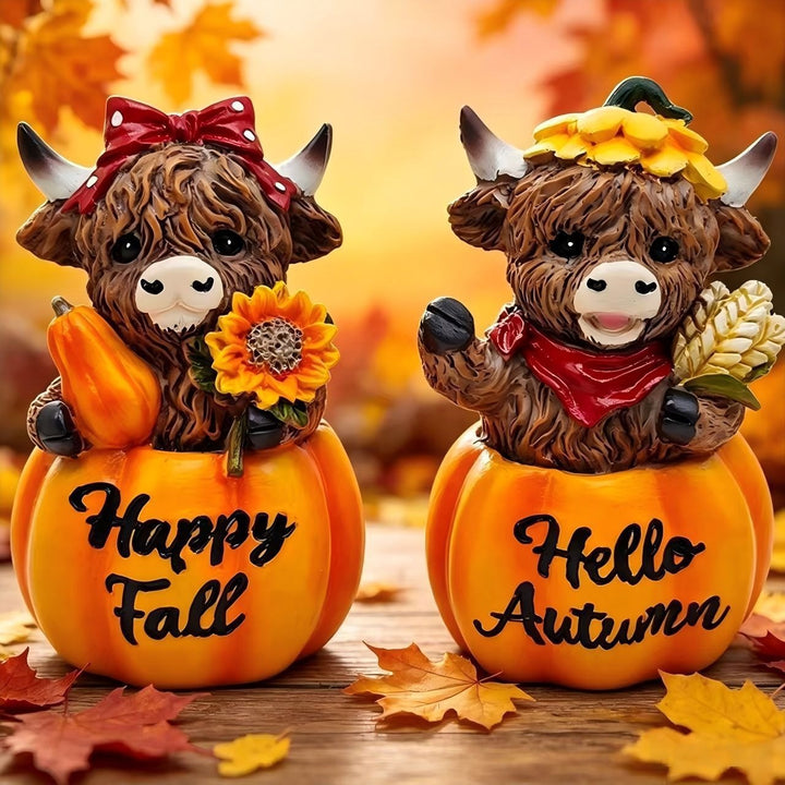 Funny decorative figure of a Highland cow in pumpkin costume Stornfield