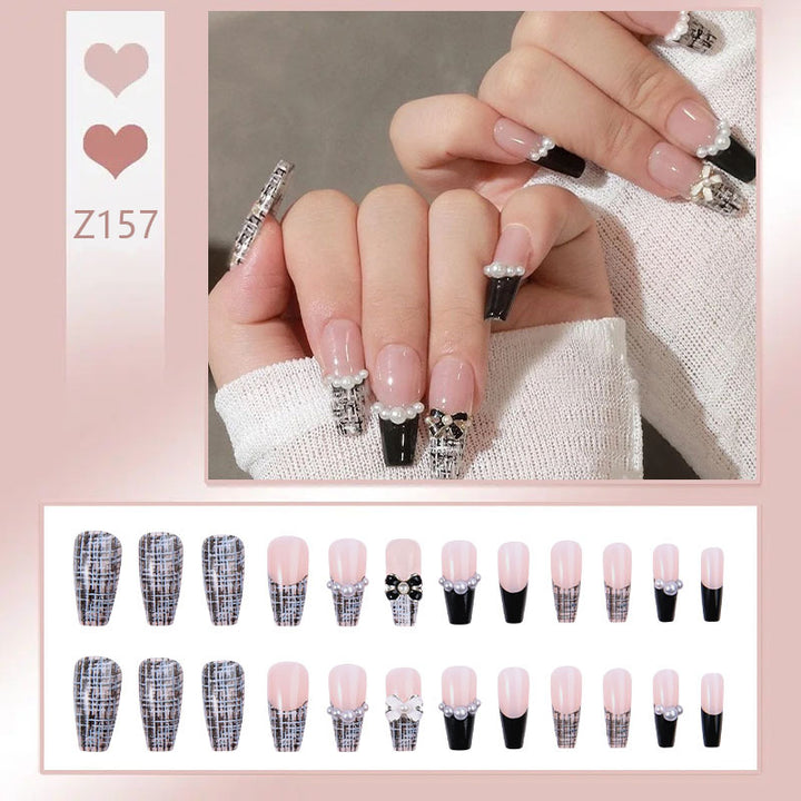 Artificial nail set with elegant pearl and flower motif Stornfield