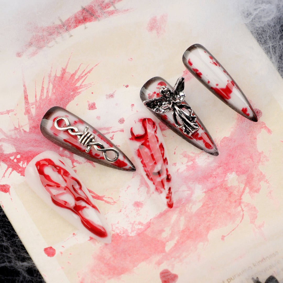 Artistic stiletto nails with blood and 3D design Stornfield