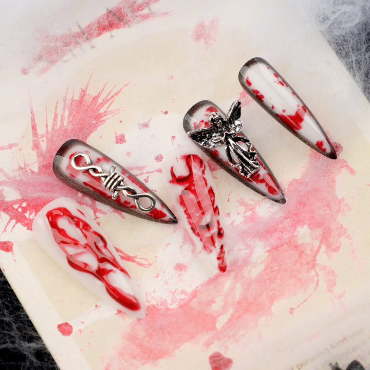 Artistic stiletto nails with blood and 3D design Stornfield