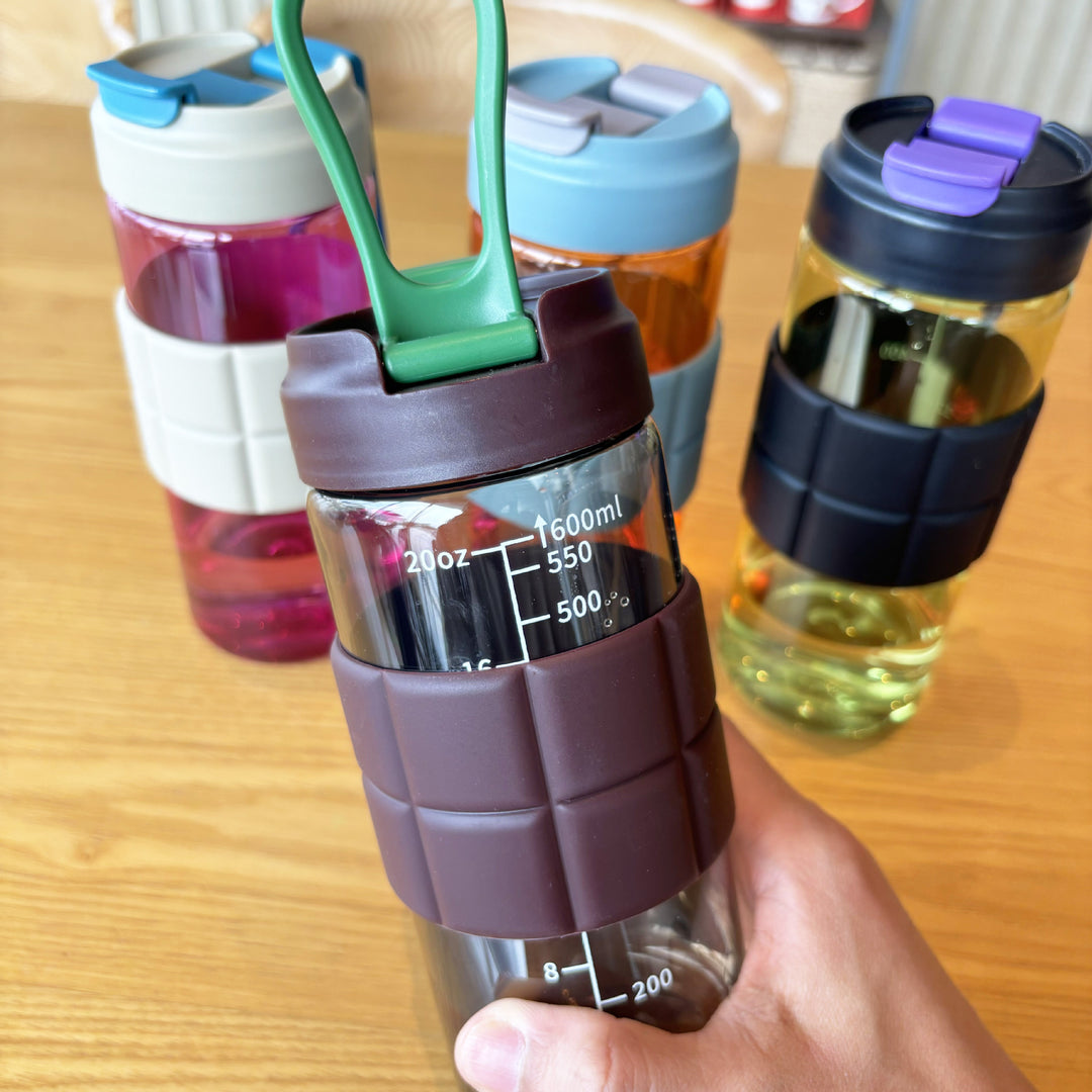 Women's transparent drinking bottle with non-slip silicone coating Stornfield