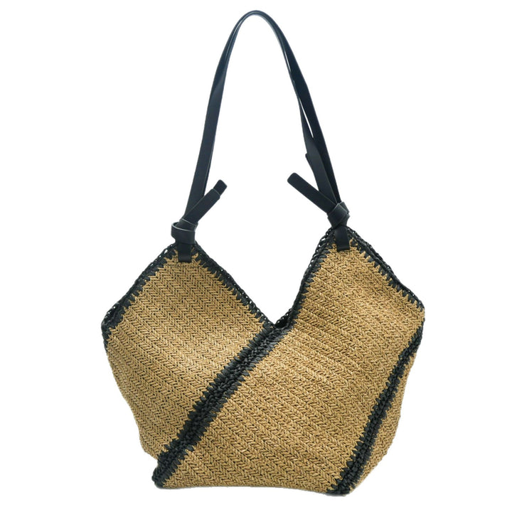 Fashionable beach bag made of woven natural material with leather handles Stornfield