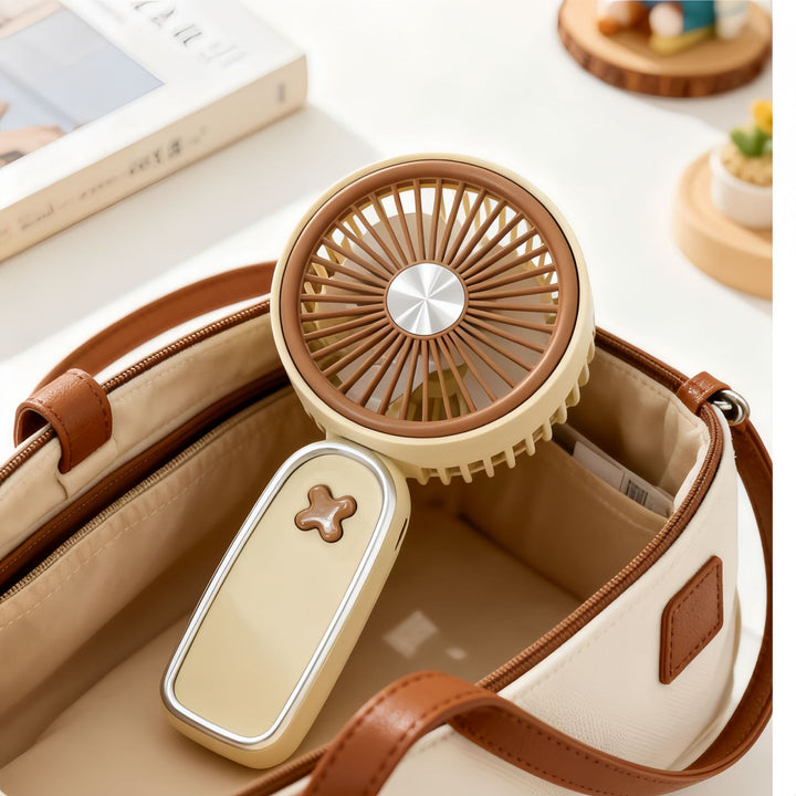 Women portable mini fan with USB charging function and ergonomic design Stornfield