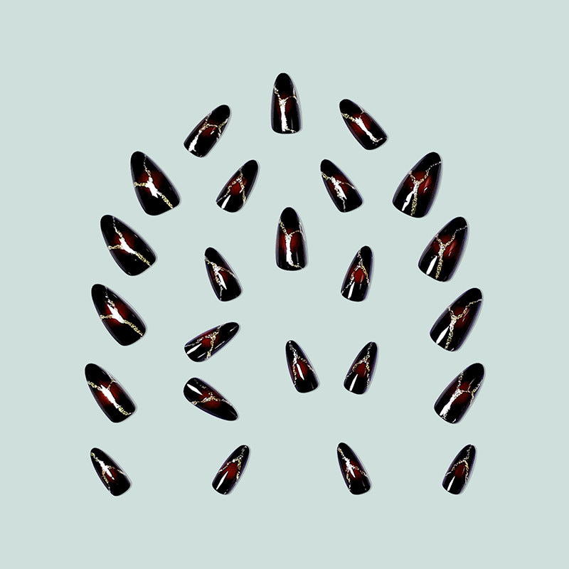 Elegant artificial nails with golden accents Stornfield