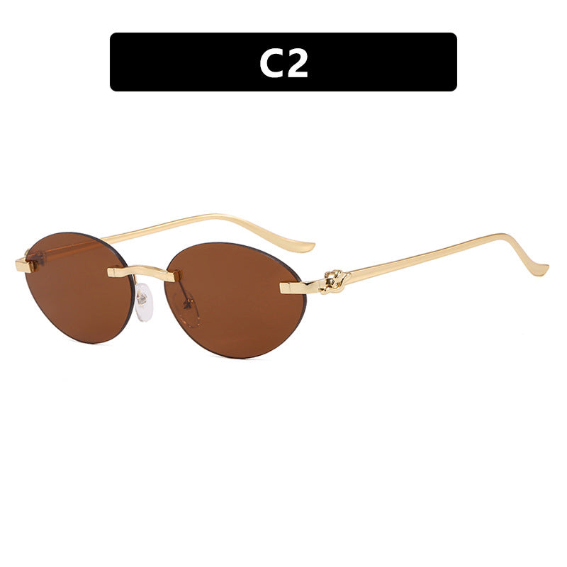Women's elegant oval sunglasses with golden accents Stornfield
