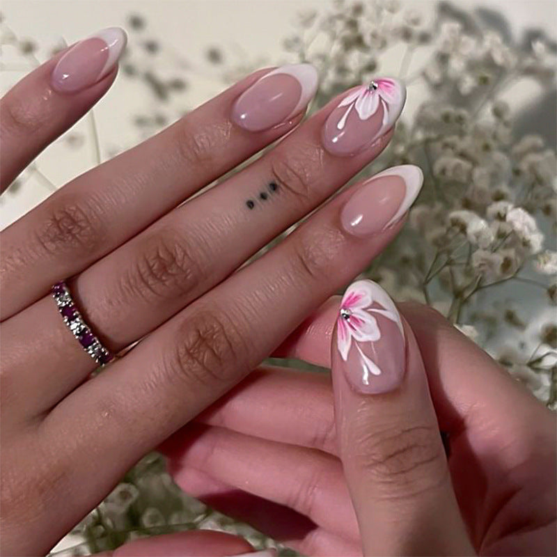 Elegant artificial nails with floral decorations Stornfield