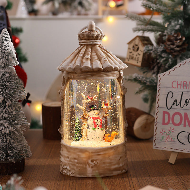Illuminated Christmas lantern with snow scenes Stornfield