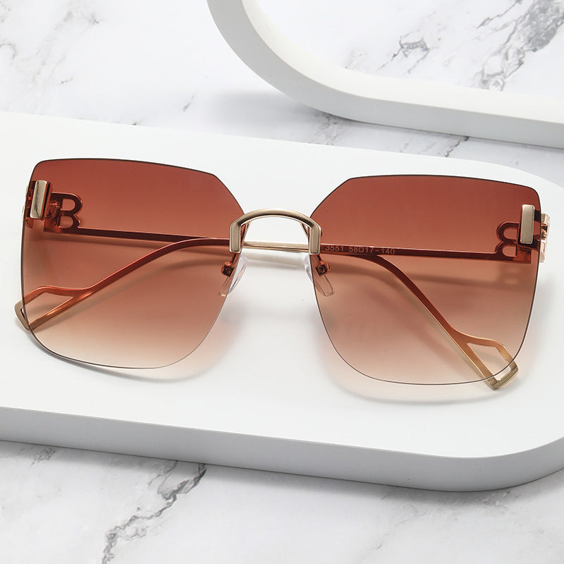 Women elegant square sunglasses with gold-colored metal frame Stornfield