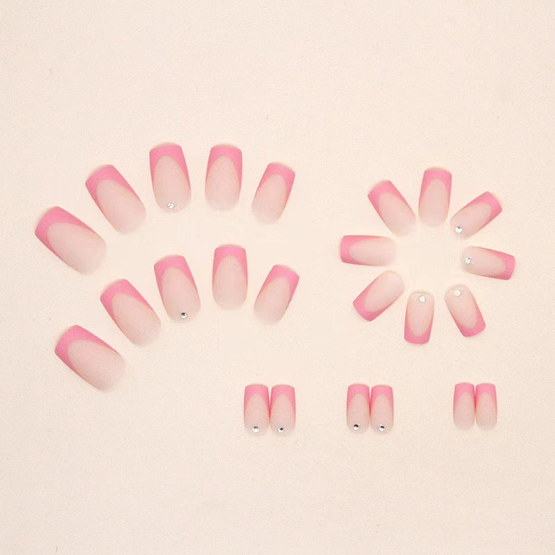 Nail set with elegant French design and glitter accents Stornfield