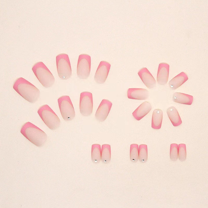 Nail set with elegant French design and glitter accents Stornfield
