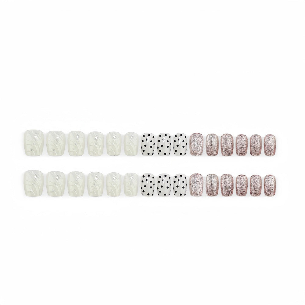 Artificial nails with diverse patterns and glitter effects Stornfield