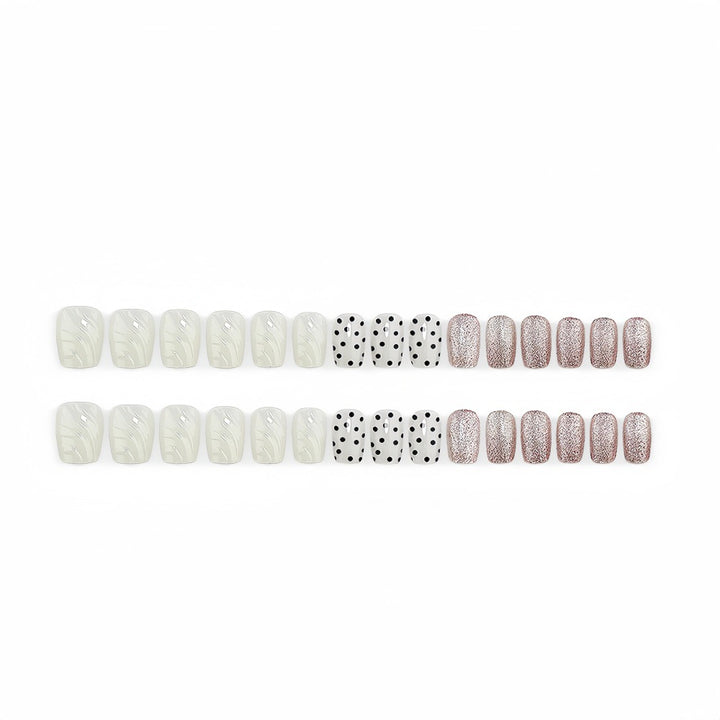 Artificial nails with diverse patterns and glitter effects Stornfield
