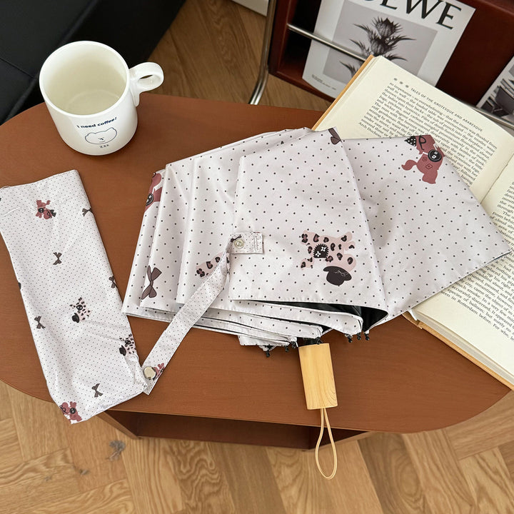 Ladies collapsible umbrella with playful design Stornfield