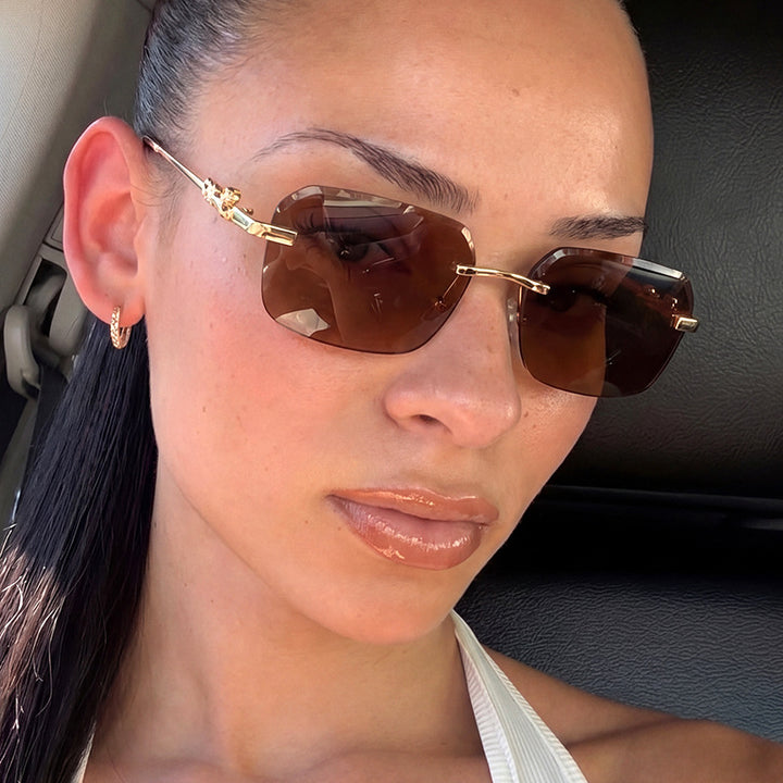 Women's fashionable square sunglasses with elegant gold frame and protective UV filter Stornfield