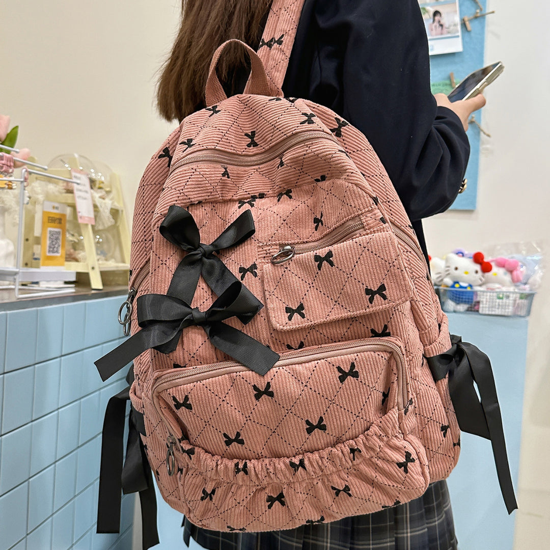 Playful backpack with bow details and practical compartments Stornfield